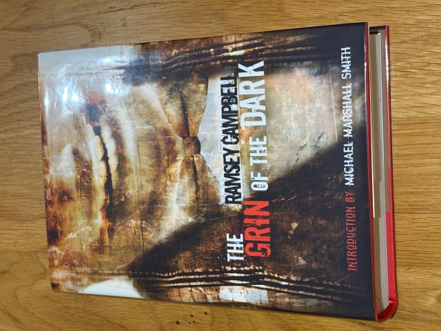 The Grin of the Dark